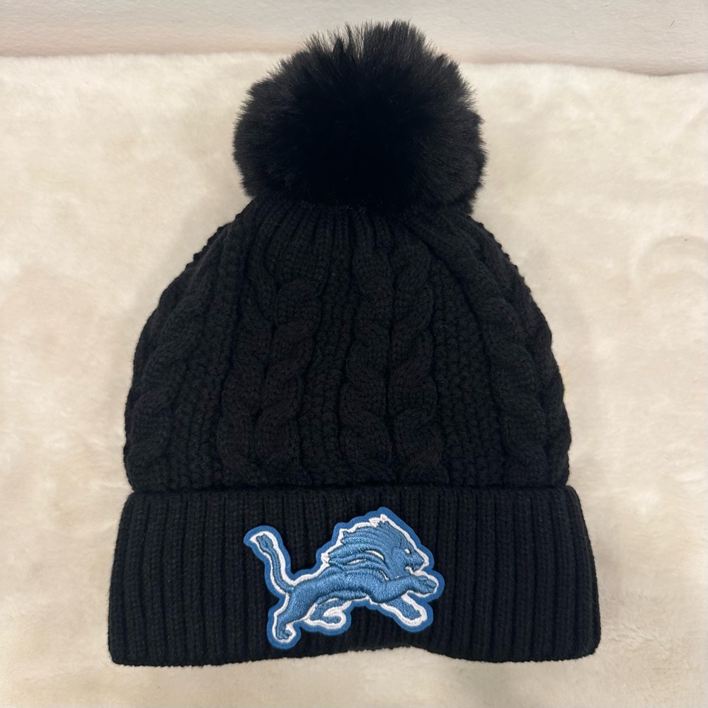 Cozy Black Knit Beanie with Blue Lions logo Emblem!